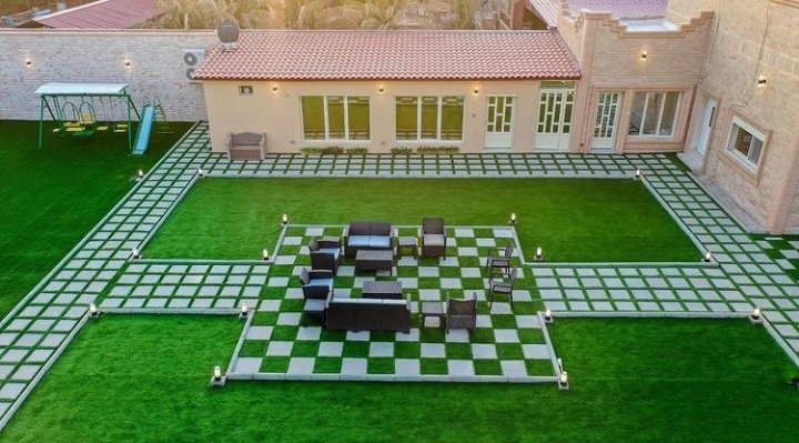 تركيب ثيل صناعي طبيعي الشكل للحدائق والمنازل في الكويت