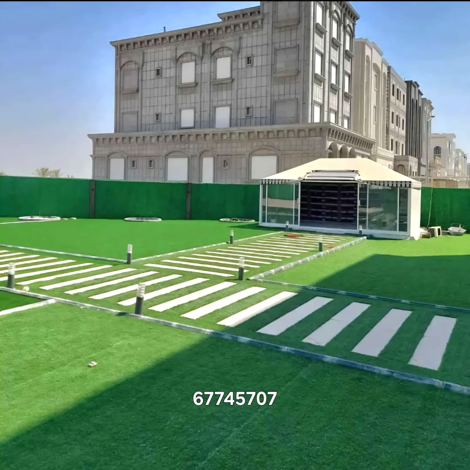 "أعمال تنسيق حدائق وتركيب ثيل صناعي داخل الكويت لتجميل المساحات الخارجية."